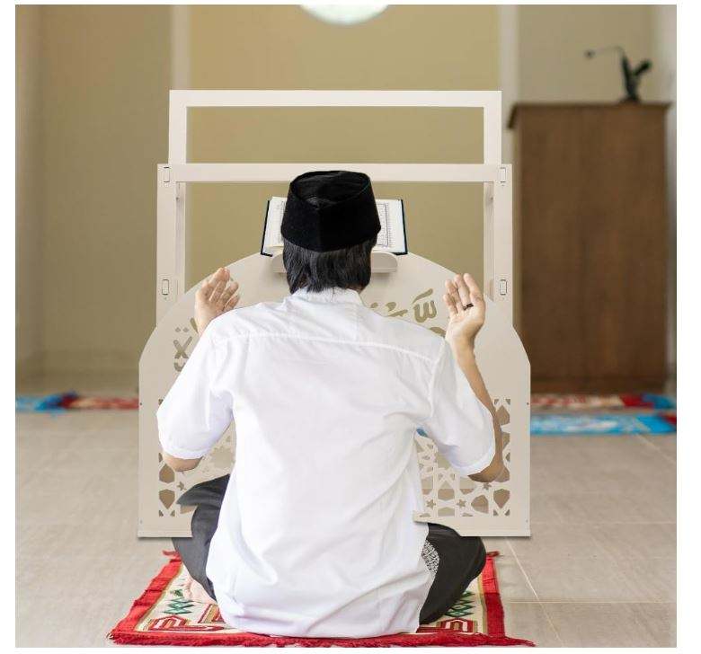 Prayer mat organizer and Quran stand in use